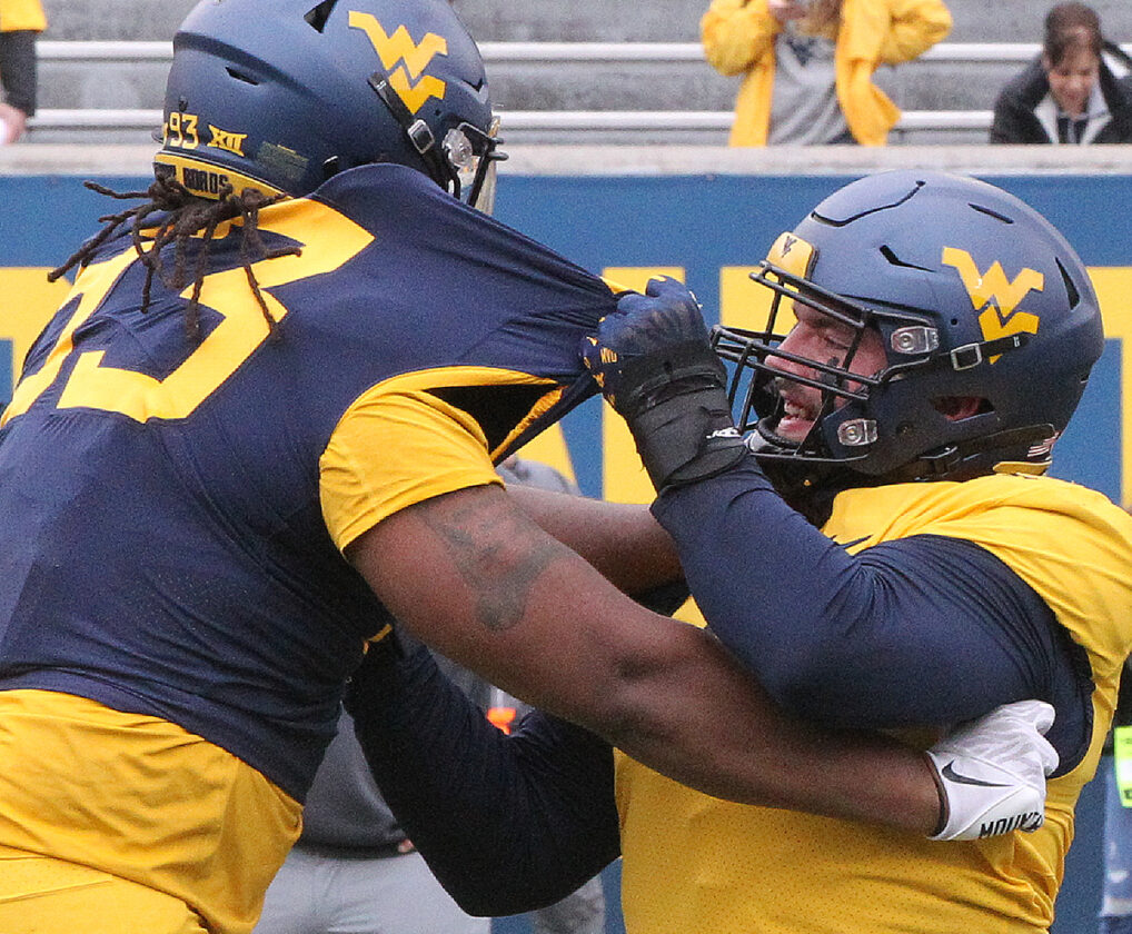 Mountaineer football coach remains mum on starting QB News, Sports